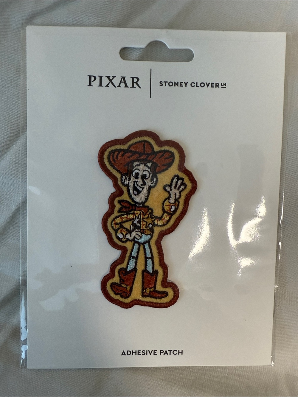 Stoney Clover Lane Pixar Woody Adhesive Patch - Brown, Yellow, Red, Blue